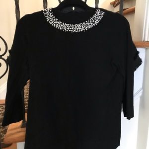 Beautiful Karl Lagerfeld sweater three-quarter sleeves knitted soft fabric.